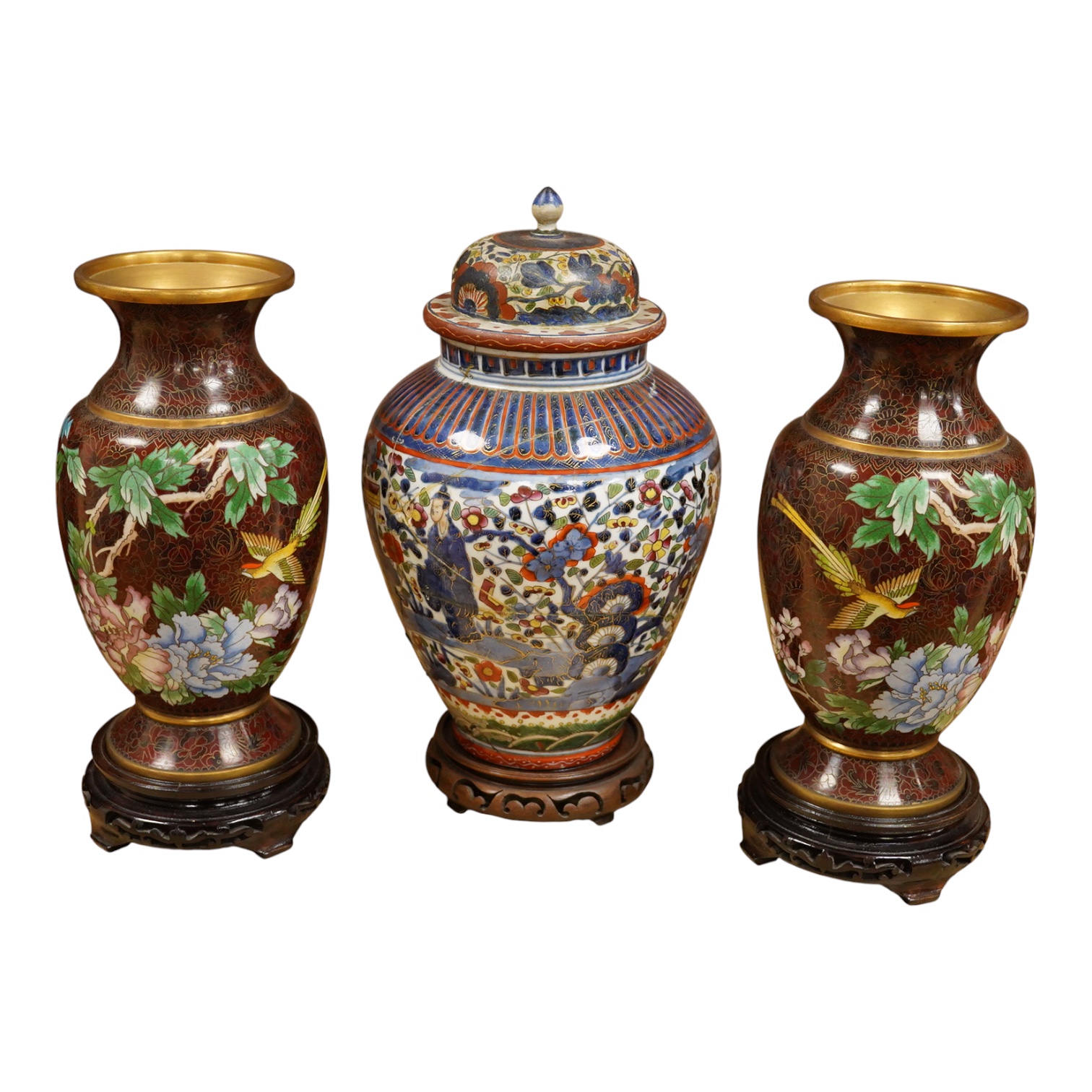 A pair of cloisonné vases on stands and Chinese clobbered vase and cover on stand (damaged). 44cm high